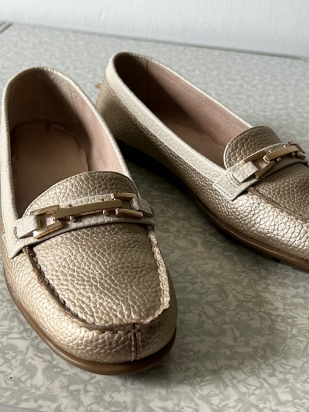 Gold loafers